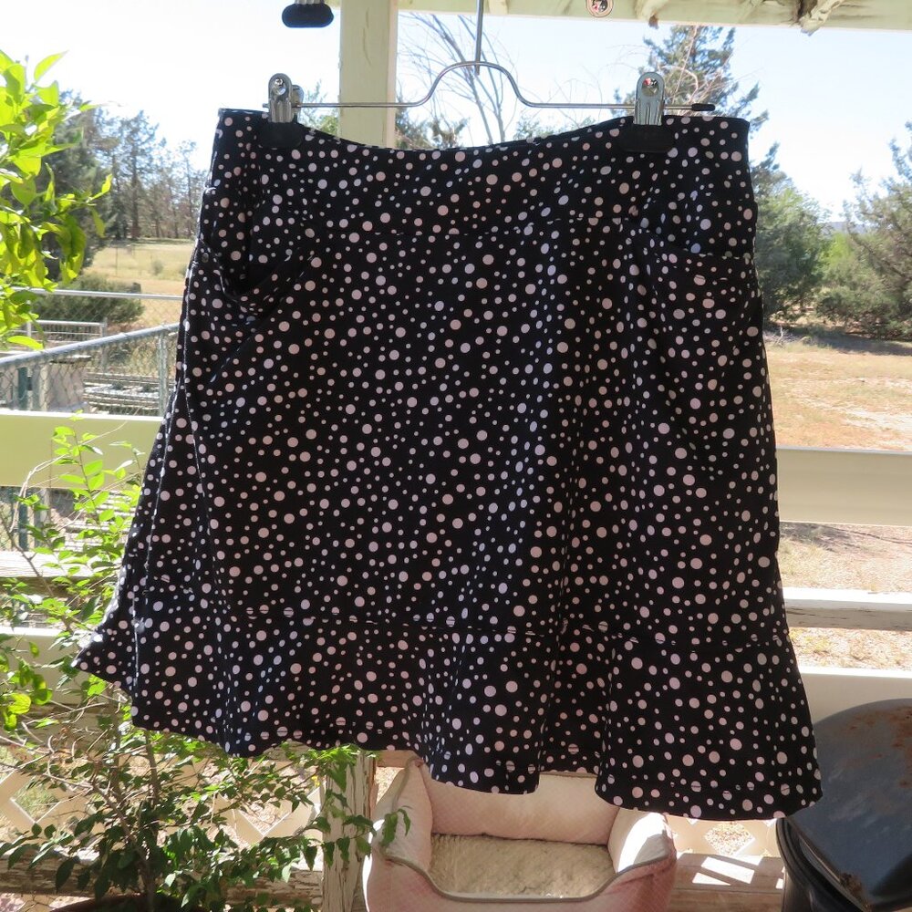 Flirty black golf tennis skirt with dots